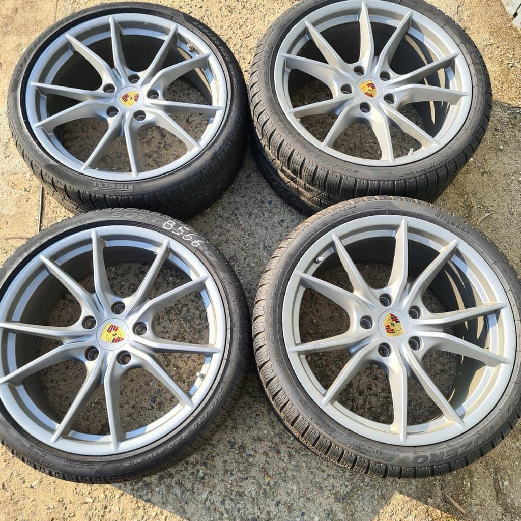 A set of four original 19-inch rims with tires
